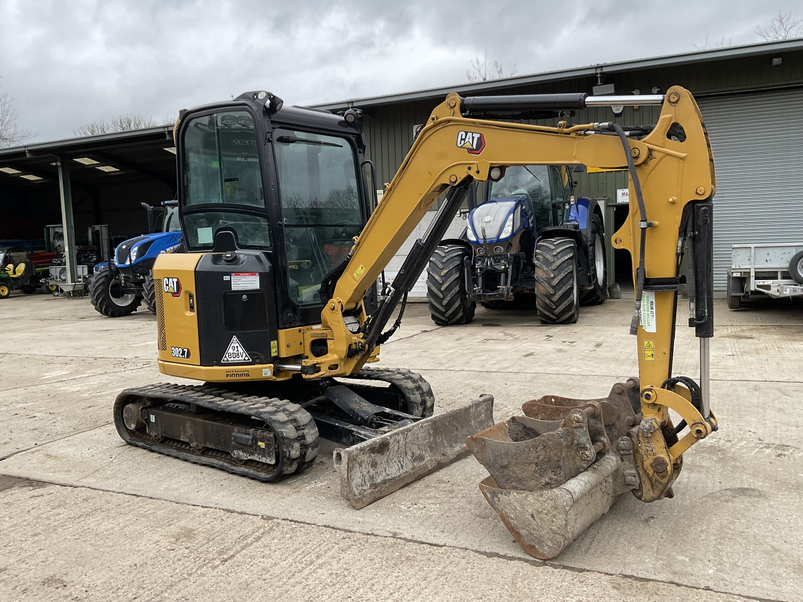 CAT 302.7